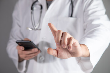 Doctor tapping on a virtual screen