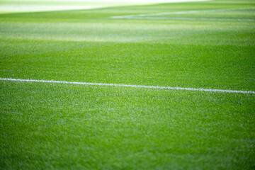 Obraz premium Maintenance of the lush green football field