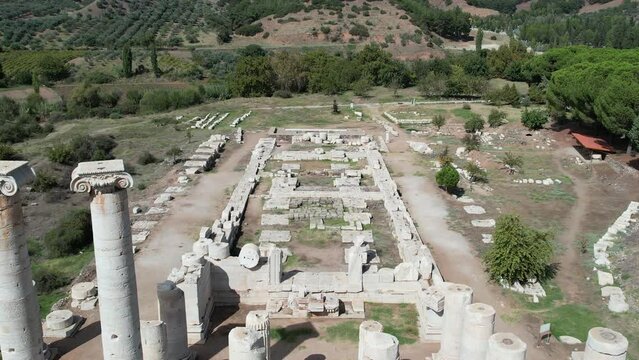 Aerial view with drone; Sardes (Sardis) Ancient City which has gymnasium and synagogue ruins and columns in Manisa, Turkey.