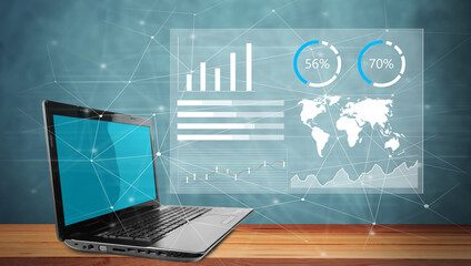 Panel with graphs and laptop