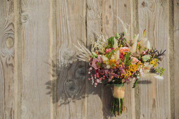 Marry at the North Sea. Summer wedding on the beach in Germany. Bridal bouquet with white and green. Boho 