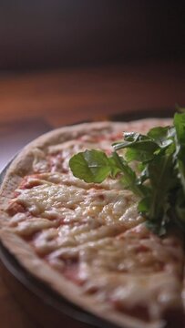 Mozzarella pizza vertical video. Italian food concept