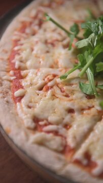 Mozzarella pizza vertical video. Italian food concept. Italian food vertical video.