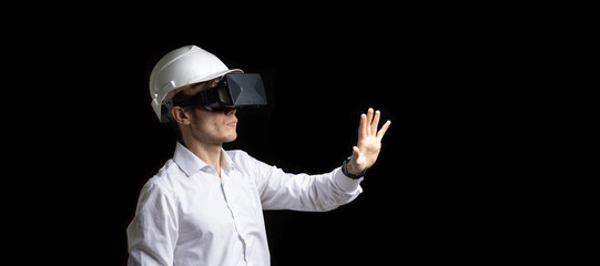 Man in business clothes architect or design engineer using VR headset goggles for design work in...