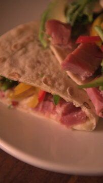 Warm video of tuna meat pita. Arabic tacos concept. vertical video of arabic food in mexico.