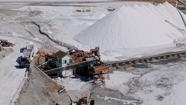Sea salt production. Machinery for the treatment of the salt. The equipment of a salt plant. The salt processing factory near SaltLake city.
