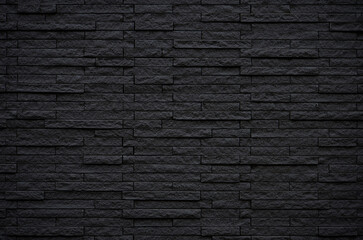 Black slate stone wall texture. Luxury tiled wall background.
