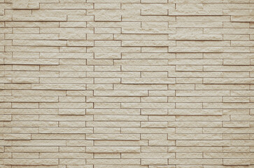 Beige slate stone wall texture. Luxury tiled wall background.