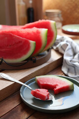 Sliced fresh juicy watermelon on wooden table