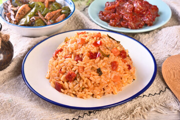 Kimchi fried rice with cheese on white plate