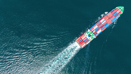 Cargo container Ship, cargo maritime ship with contrail in the ocean ship carrying container and...