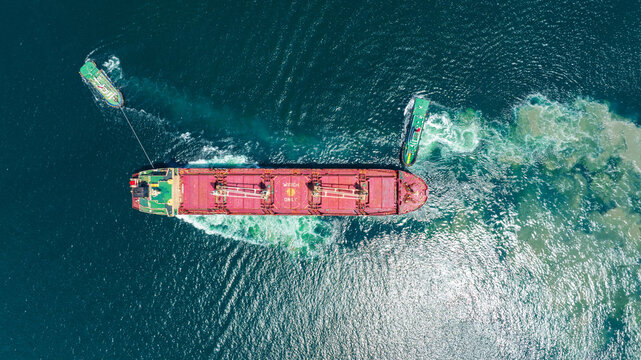 Tug Boat drag Barge ship carry Metal steel pipe construction unit , No International Sewage sludge Pollution Prevention Certificate, Sewage Sludge in the sea made by Activity of ship concept