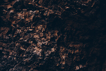Brown texture. Stone background. Rock texture. Grunge Rough structure. Abstract texture. Rock surface with cracks. Rock pile. Paint spots wall. Wall marble.