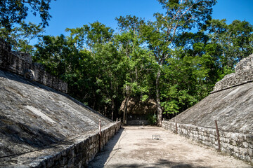 Fototapeta na wymiar Mayan Pok-ta-pok arena at Coba ruins in mexico