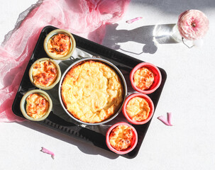 Step 9. Ready hot cheese curd muffins and a pie in a baking dish.
