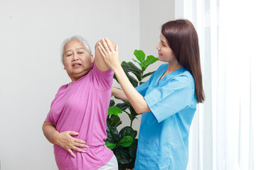 physiotherapist, medical specialist Stimulates recovery of the body for the elderly. Concept of physical rehabilitation for the elderly. Elderly Health and Physical Therapy Center