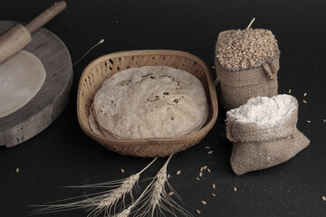 Rustic shot of a plate of chapati surrounded by ingredients