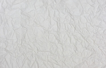 Texture of white thin crumpled paper. Background for design.
