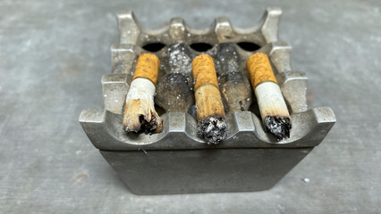 Cigarette on ashtray