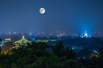 Family Reunion Day Concept: Chinese Traditional Festival Mid-Autumn Festival - moon at the night on the Mid-autumn Festival