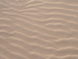Fototapeta na wymiar Sand dunes wave pattern background