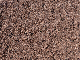 Reddish gravel floor texture background