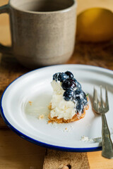 Homemade blueberry tart with soft cheese