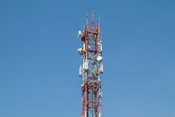 Telecommunication Tower or mast with antenna for TV and radio broadcasting.