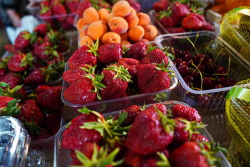 Sale of juicy farm strawberries on the market