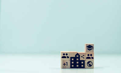 Friends concept education development and growth on wooden cube with icons New skills for the evolution of copy space technology.