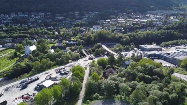 Road E16 going into arnanipa tunnel from Arna to Takvam outside Bergen - Aerial view of road with cars driving into tunnel - Norway
