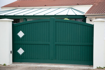 high steel green gate aluminum portal with blades of suburbs house
