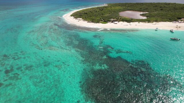 People Snorkeling Near Prickly Pear Cays Off The Coast Of  The Caribbean Island Of Anguilla