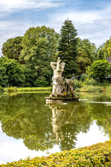 Obraz premium Hercules figure in the Schleswig Baroque Garden, near Gottorf Castle