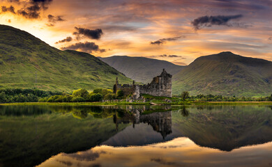 The ruins of Kilchurn castle on Loch Awe at sunset in Scotland