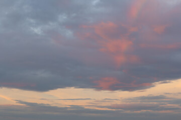 Naklejka na ściany i meble Twilight sky with clouds in the sunset.