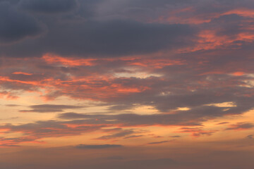 Naklejka na ściany i meble Twilight sky with clouds in the sunset.