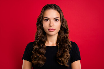 Photo of adorable pretty young woman wear black t-shirt smiling isolated red color background