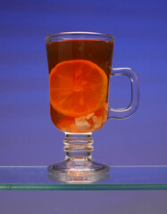 Ginger tea with lemon, blue background ... 