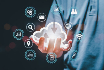 Businessman holding big data analytics and business intelligence concept. with chart and graph icons on a digital screen interface and a businessman