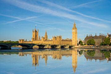Fototapeta na wymiar Big Ben and Westminster bridge with reflection in London. England