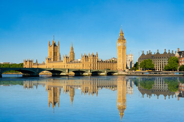 Naklejka na ściany i meble Big Ben and Westminster bridge with reflection in London. England