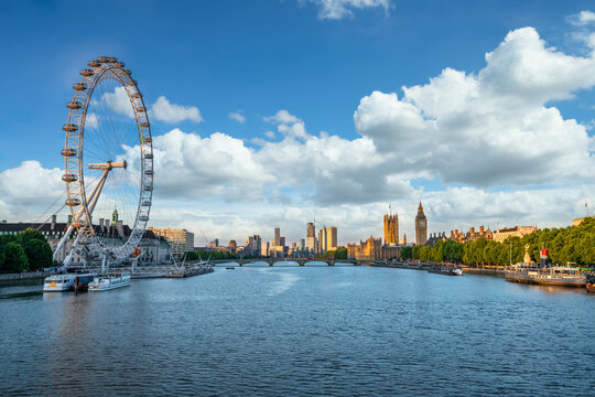 Skyline panorama of river Thames with London eye and Big Ben with sunny morning light 