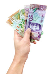 Hand holding New Zealand banknotes. Transparent PNG