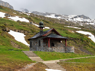 Fototapeta na wymiar A stone chapel of the holy brother Nikolaus - Bruder Klaus - at Klausen pass in Switzerland