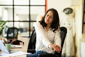 Portrait of tired businesswoman