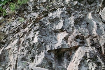 Stone rocks on the mountain as background.