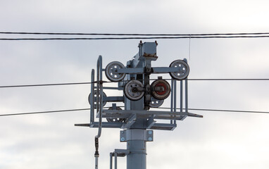 Electric pole on the background of the sunset. Technology