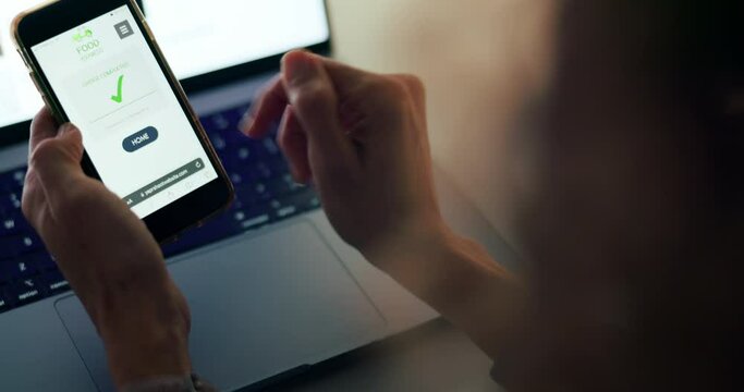 Woman with a smartphone, app to order food for delivery online and using gps tech to deliver to your home. Ordering organic, healthy lunch from a restaurant with mobile apps and courier to location