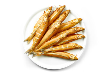 Hot-smoked fish in a plate on a white background. Close-up. Selective focus